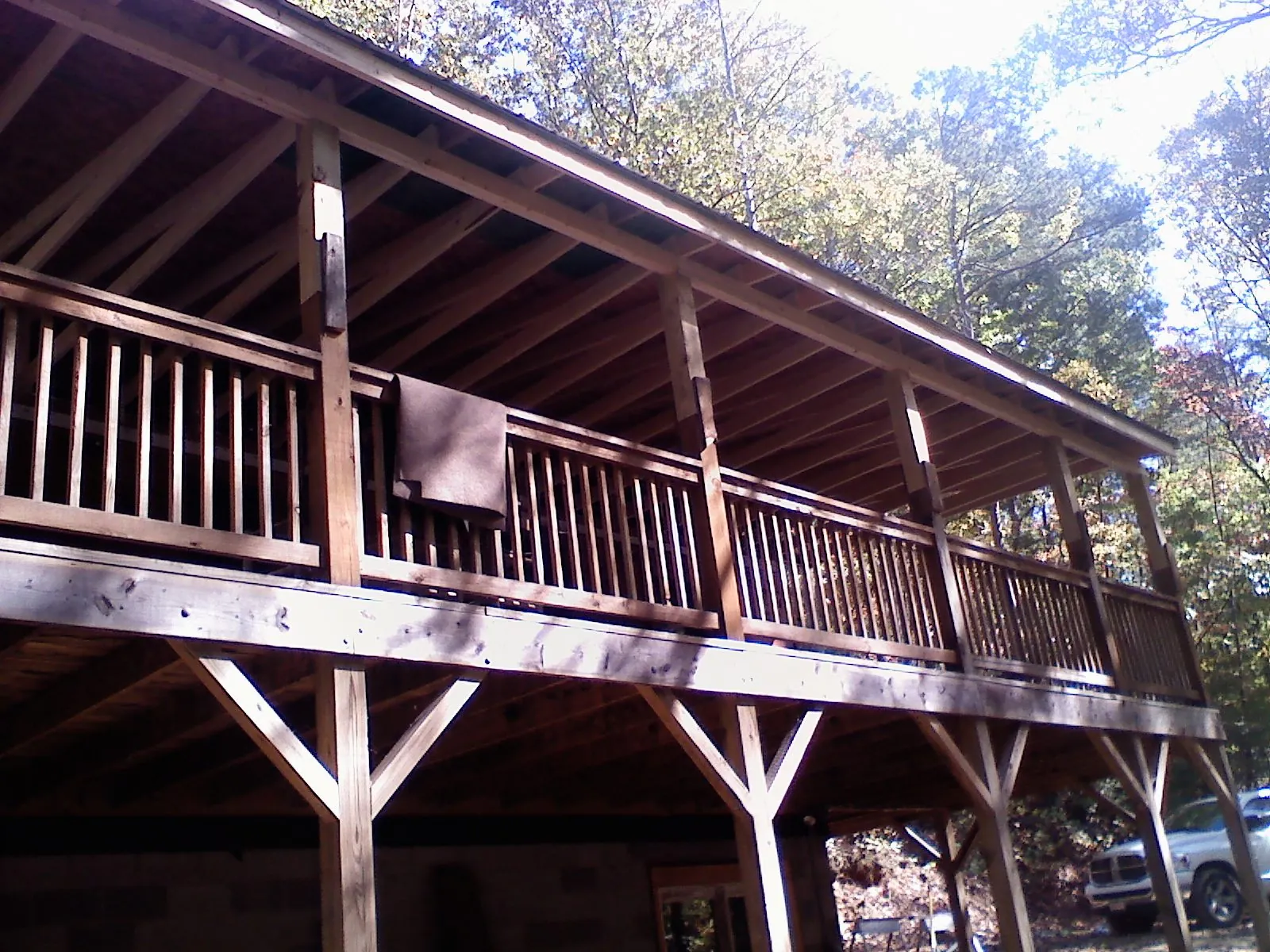 Timber framing under a new elevated porch and deck — Roof Leak Repair in Fort Shaw by Roofing Brothers